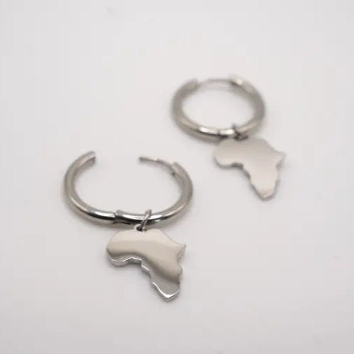 Silver hoop earrings with Africa continent-shaped charms on a white background
