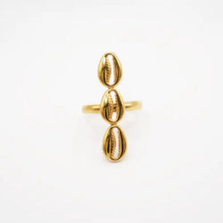 Gold ring with three vertical cowries and a unique design on a white background