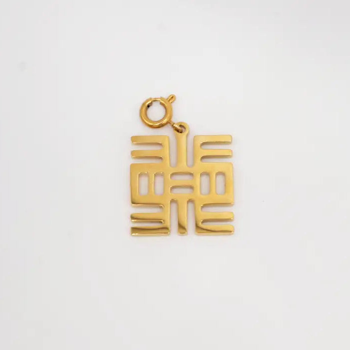 Gold Adinkra symbol pendant on a light gray background. NEA ONNIM NO SUA A, OH. symbol of knowledge.