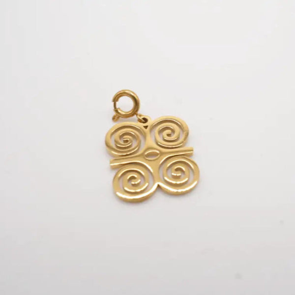 Gold spiral pendant on a light gray background. Dwennimmen charm. adinkra charm.